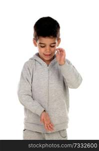 Gipsy child with tracksuit clapping isolated on a white background