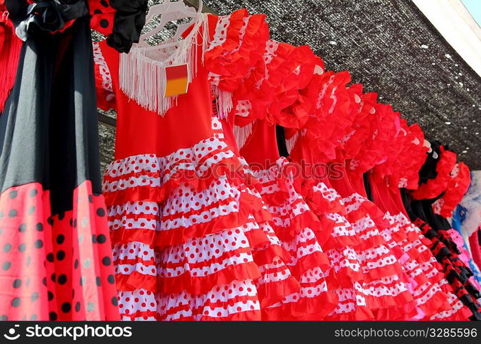 Gipsy red spots dress row typical from Andalusia Spain