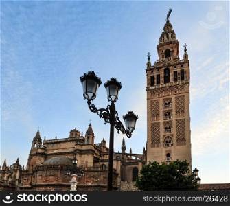Giralda bell tower in evening Seville city, Spain. Constructed in 1184-1198.