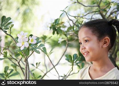 Girl (5-6 years) in garden portrait