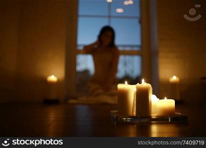 Girl adult evening candles romance holiday christmas home portrait