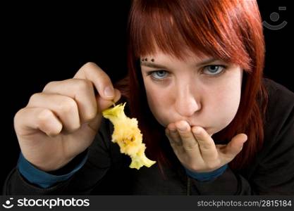 Girl almost throwing up after eating an apple