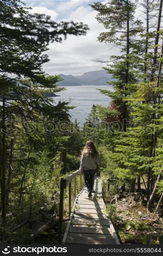 Girl along James W. Humber Hiking Trail, Norris Point, Gros Morne National Park, Newfoundland And Labrador, Canada