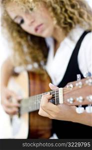 Girl and Acoustic Guitar