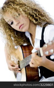 Girl and Acoustic Guitar