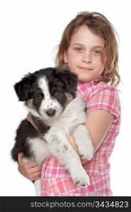 Girl and border collie puppy. Girl and border collie puppy in front of white background