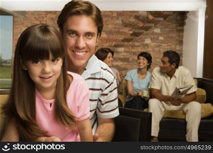 Girl and father with family