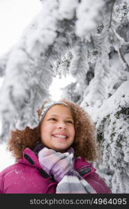 Girl and snowy branches