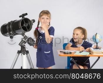 Girl astronomer thought, another girl with a smile looking at her