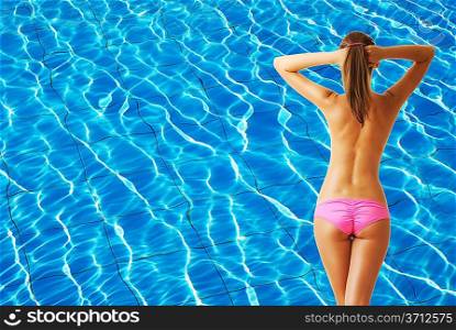 Girl at tropical swimming pool. Collage.