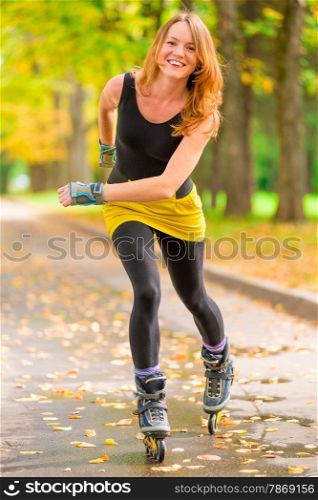 girl athlete fast rides on roller skates
