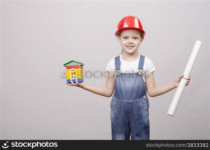 Girl Builder holds in one hand a small house, in the other hand drawing