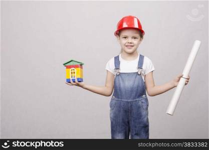 Girl Builder holds in one hand a small house, in the other hand drawing