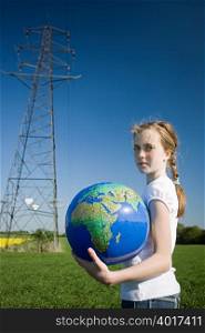 Girl by pylon with globe