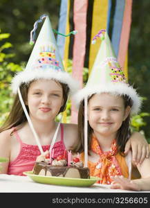 Girl celebrating her birthday with her sister