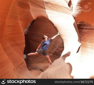 girl climbing in the canyon walls