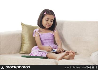 Girl colouring in a book