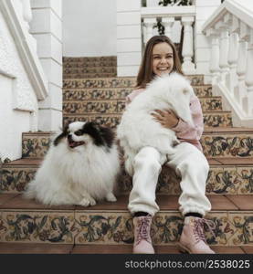 girl cute white puppies sitting stairs