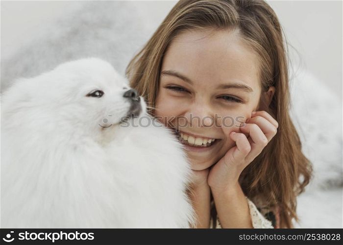 girl dog being happy play