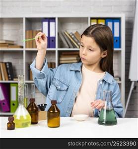girl doing chemistry experiments