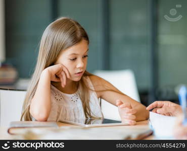 Girl doing her homework in library. Time to do my homework