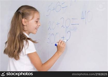 girl doing math whiteboard