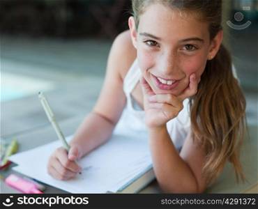 Girl drawing outdoors