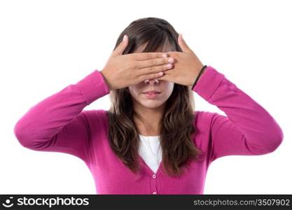 Girl dressed in pink covering her eyes on a white background