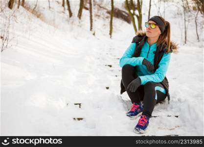 Girl dressed up for winter. Staying fit despite cold. Health fitness nature fashion concept. . Girl dressed up for winter