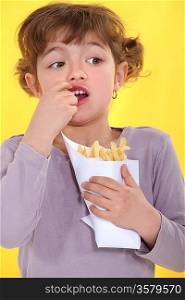 Girl eating a bag of chips