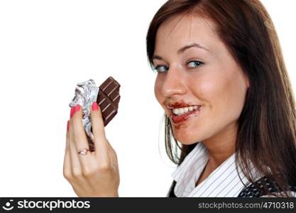 Girl eating a chocolate candy