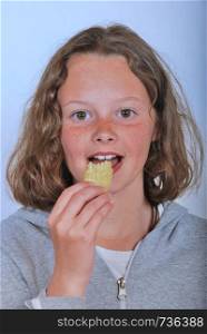 Girl eating chip