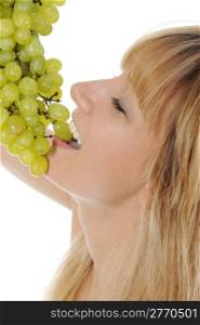 Girl eating grapes. Isolated on white background