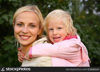 girl embraces the mother