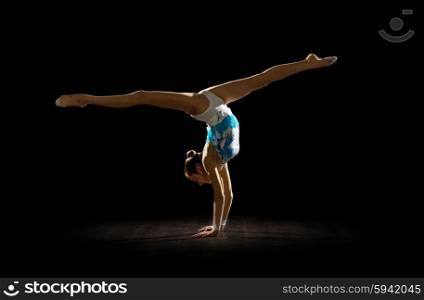 Girl engaged art gymnastic isolated