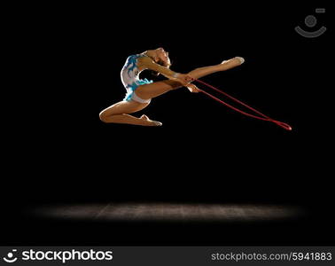 Girl engaged art gymnastics isolated