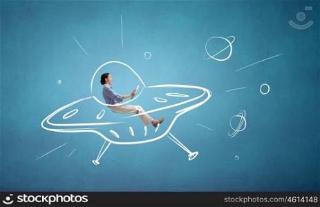 Girl flying in spaceship. Young funny woman riding in drawn ufo ship