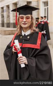 girl graduation with diploma