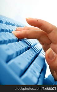 girl hands typing on keyboard macro close up