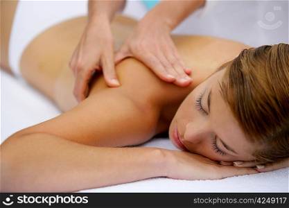 Girl having a back massage