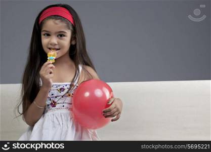 Girl having a lollipop