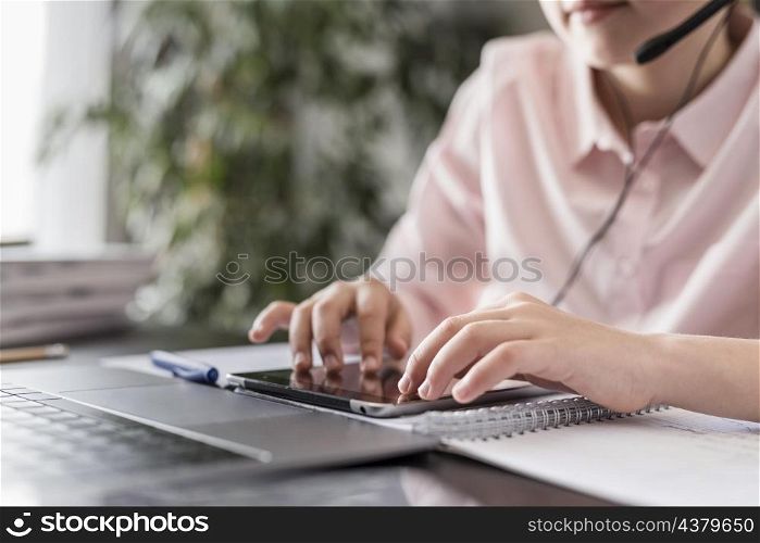girl having online class her tablet