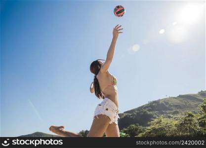 girl hitting volleyball