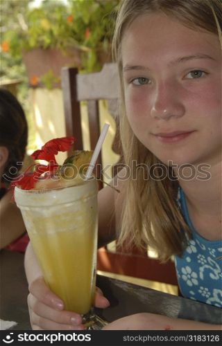 Girl holding a beverage