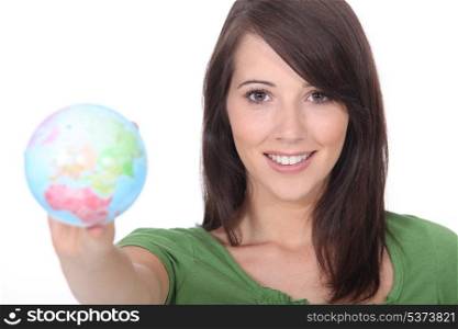 Girl holding a globe