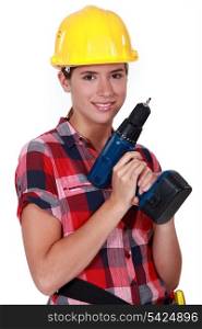 Girl holding a screwdriver
