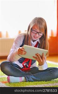 girl holding a touchpad tablet