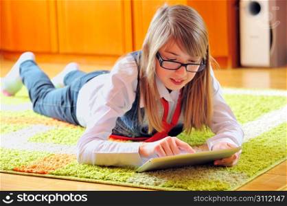 girl holding a touchpad tablet