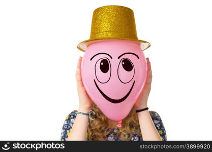 Girl holding balloon with expression of smiling face and gold hat isolated on white background