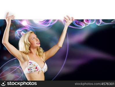 Girl holding banner. Young girl in white bikini with blank banner. Place for text